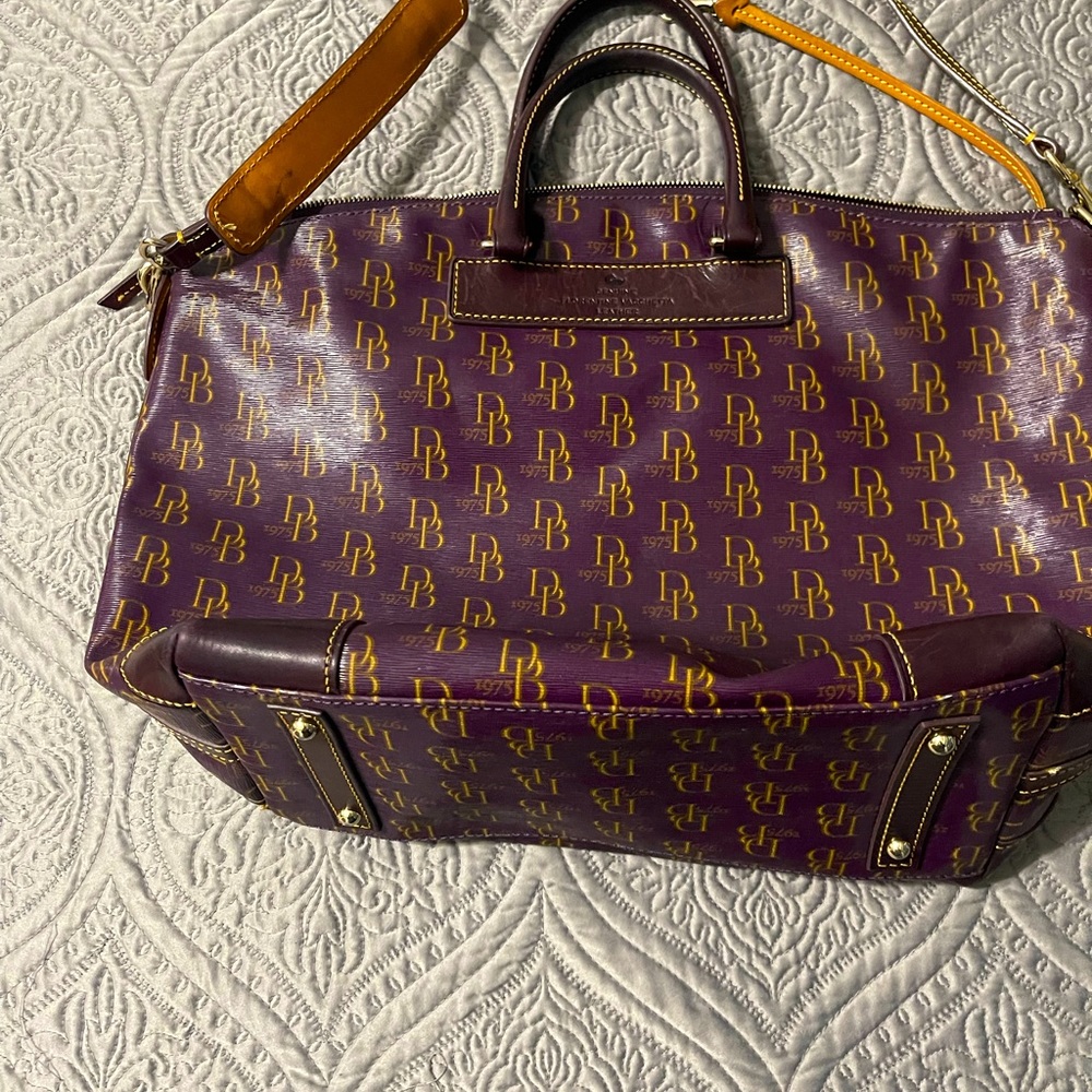 Purse practically new on outside of bag some what slightly worn in side